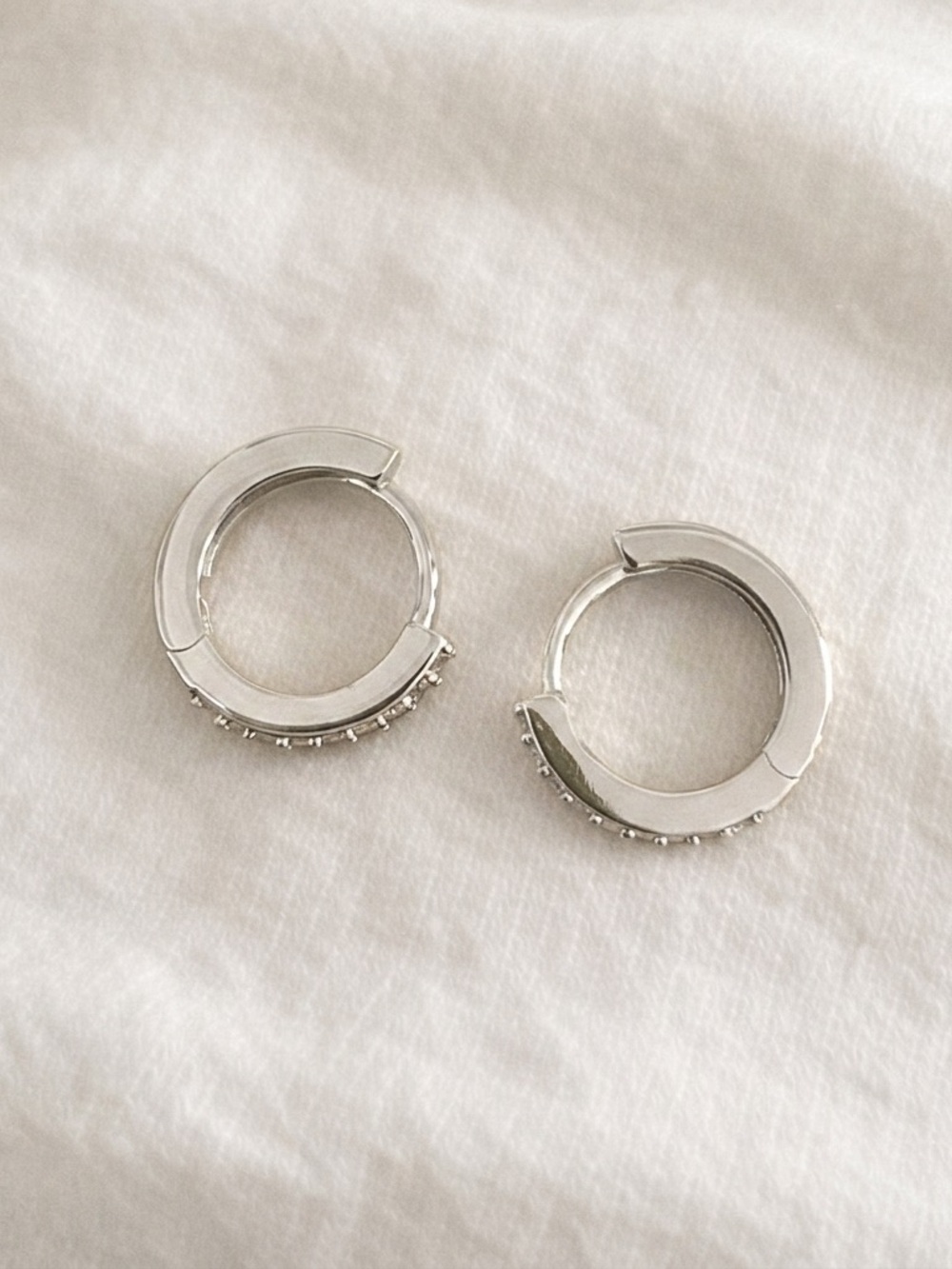 Silver plated stainless steel cubic zirconia Huggies hoop earrings - Picture 4 of 5